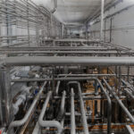 Cheese industry interior and production of hard cheese background